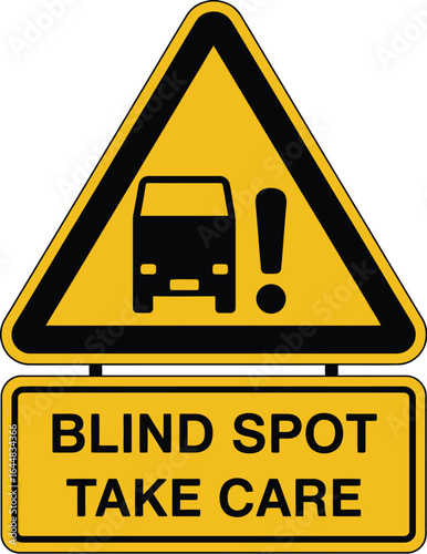 Yellow warning triangle sign with truck and exclamation mark indicating blind spot