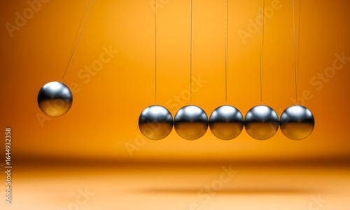 Photography Newton's cradle 3d on orange background