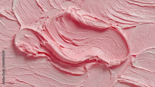 Textured pink icing swirls