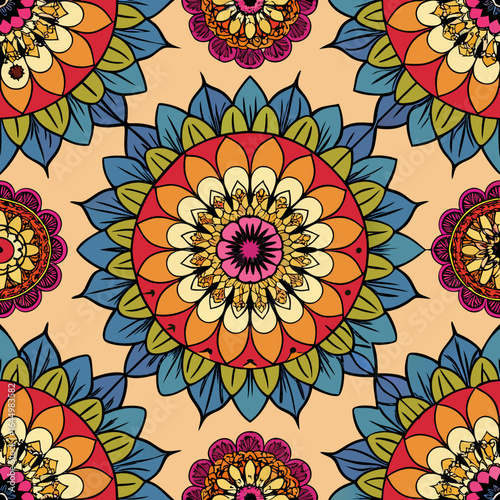 Vibrant seamless pattern of colorful mandala flowers with intricate petals on a warm beige background