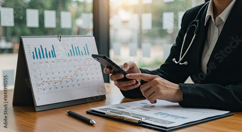 man working on laptop and mobile 