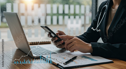 man working on laptop and mobile 