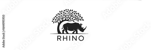 Silhouette of a rhino standing confidently underneath a majestic tree with text reading 'rhino'