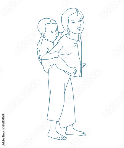 A vietnam girl is carrying a baby on her back, both barefoot and wearing simple clothes