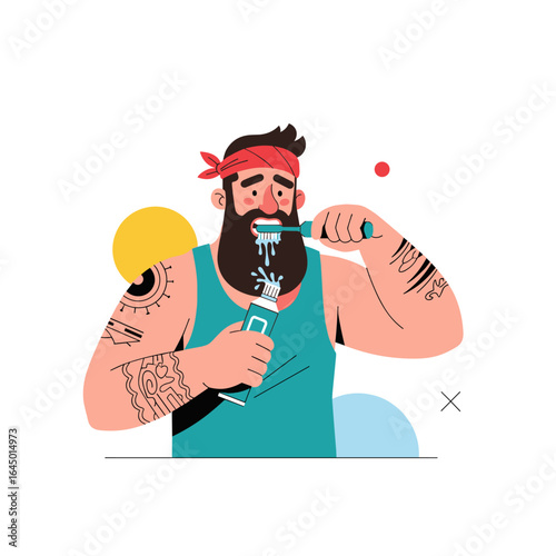 Tattooed man with beard brushing teeth with toothpaste and toothbrush daily morning routine