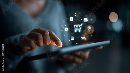Person Using Tablet For Online Shopping With Glowing Interface Icons