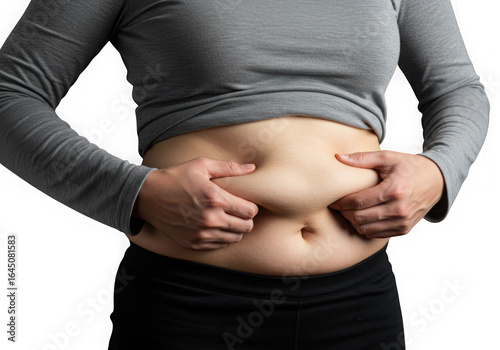 Woman pinching excess belly fat