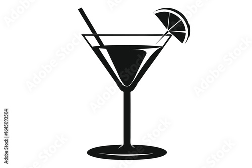 Black martini shows elegant drink with lemon and straw on white background