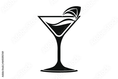 Elegant black martini glass filled with liquor and decorative garnish isolated on white