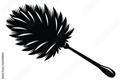 Black silhouette of a feather duster displays vintage cleaning appliance against a white backdrop