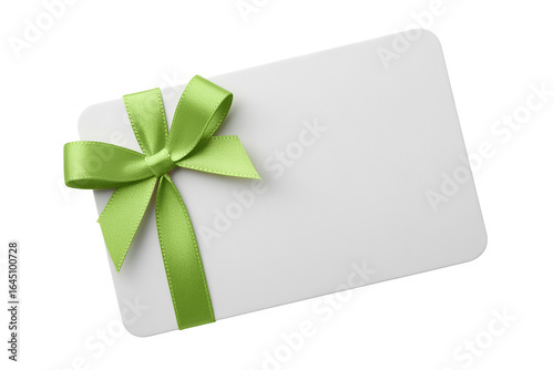 Blank white gift card tied with a bright green satin ribbon bow