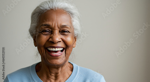 Joyful Elderly Black Woman's Portrait Radiant Smile and Silver Hair