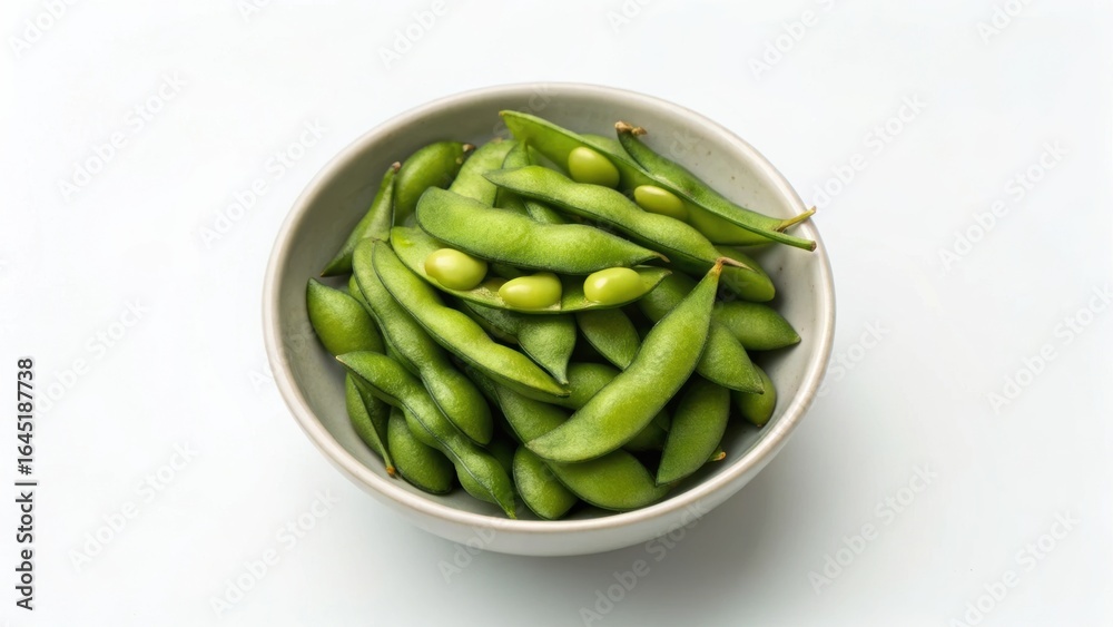 Plant-Based Diet Fresh edamame pods displayed in a bowl, ready to be enjoyed as a healthy snack or appetizer. Plant-Based Diet Fresh edamame pods displayed in a bowl, ready to be enjoyed as a healthy snack or appetizer.