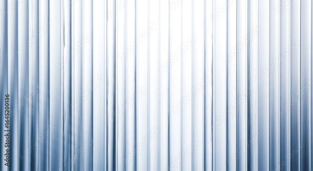 Obraz premium This image features a series of evenly spaced vertical ribs The texture transitions from a deep cool blue on the sides to a bright almost white light at the top