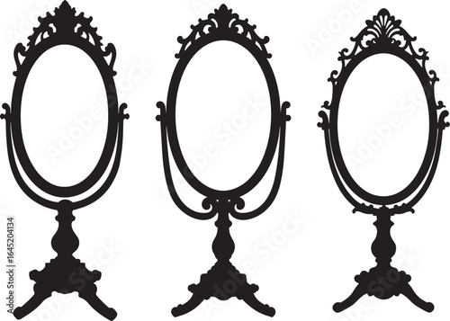 Ornate oval vanity mirrors on stands silhouette