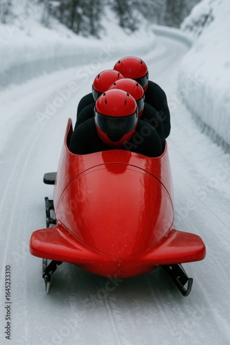 Red bobsled team races along an icy track in a winter event, showcasing speed and collaboration as part of competitive winter sports.