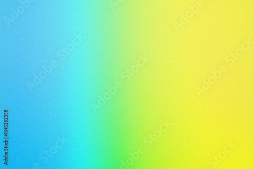 黄色と水色の淡い粒子のグラデーション背景ノイズ