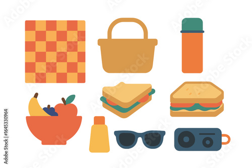 Enjoying a sunny picnic with delicious food, drinks, and leisure items in a vibrant outdoor setting