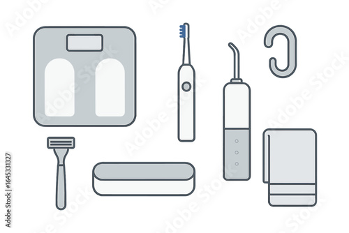 Various bathroom hygiene tools arranged on a flat surface, showcasing personal care essentials for daily routines