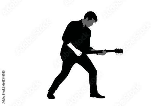 Silhouette of a Man Playing Electric Guitar with Passion and Energy