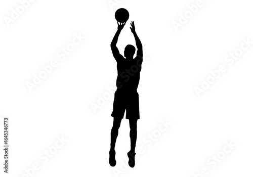 Silhouette of Basketball Player Shooting Ball in Air