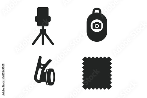 Camera accessories arranged for a photography setup on a table in a well-lit studio during the day