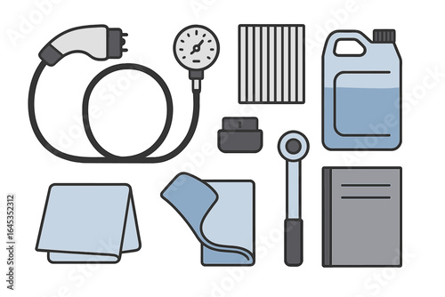 Tools and supplies for vehicle maintenance and care in a workshop setting on a bright, clean work surface
