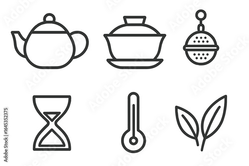 Essential tools for brewing the perfect cup of tea with various accessories and measuring equipment