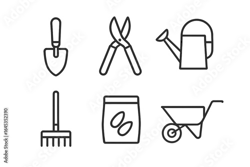Gardening tools arranged neatly illustrating essential equipment for planting and maintenance in backyard gardens