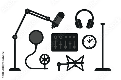 Audio recording equipment arranged on a surface for a creative project setup in a studio environment