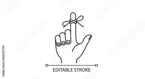 A finger with a string tied around it isolated on white background