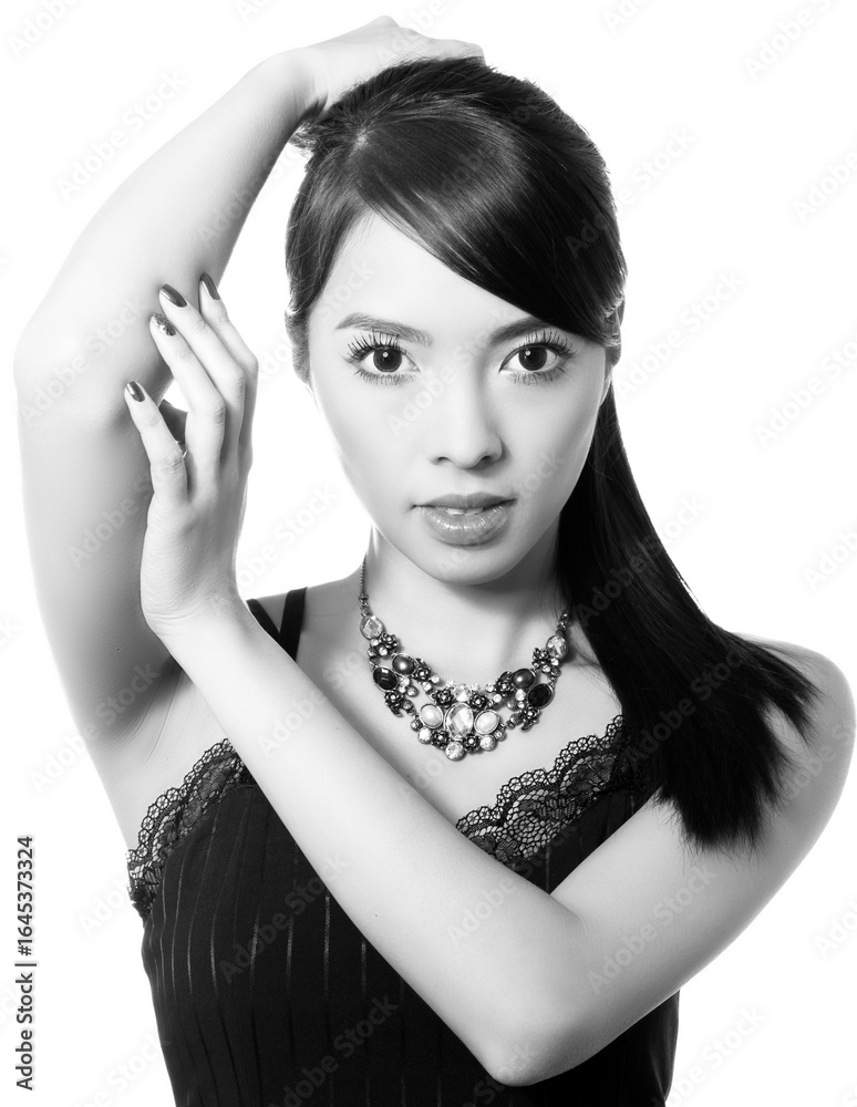 Obraz premium Beautiful asian woman with long dark and healthy hair and clear skin