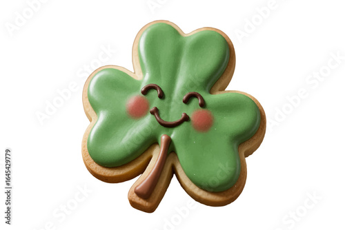 A cute smiling shamrock cookie with green icing for a St. Patrick's Day celebration, isolated.