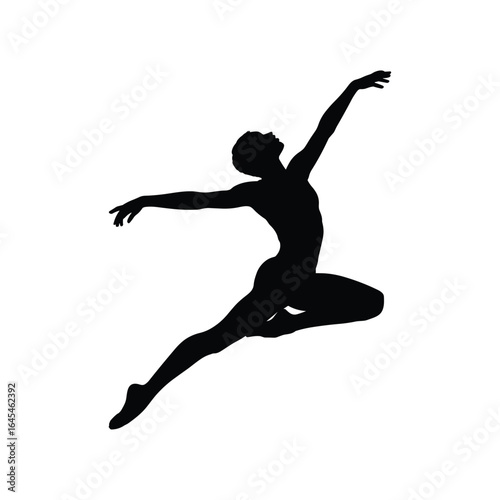 Silhouette of a graceful ballerina in a dynamic leaping pose