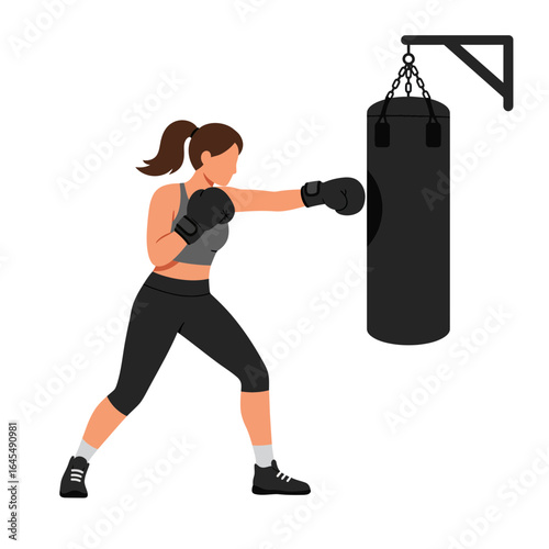 Power and Precision: A determined woman punches a heavy bag with focused intensity, showcasing strength and dedication in a dynamic display of fitness.