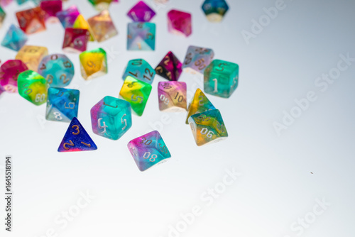 different colours dices for fantasy dnd and rpg tabletop games. Board game polyhedral dices with different sides isolated on white background