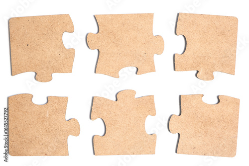 Collection of various pieces of puzzle on white background.