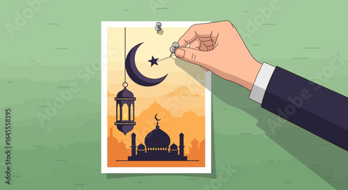 A hand pins a poster depicting Islamic symbols on a green wall.