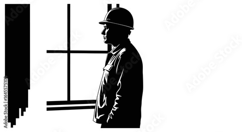 construction worker contemplating future projects a strong black and white silhouette for industrial designs safety manuals and construction company branding