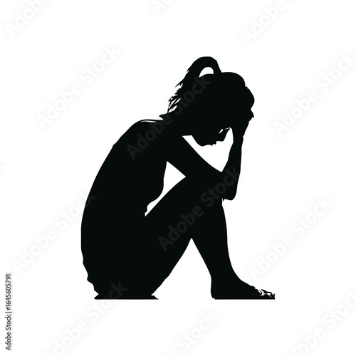 Silhouette of a woman, head in hands, in deep distress.
