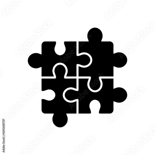 Four puzzle pieces joined, symbolizing unity and collaboration.
