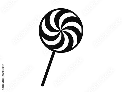 Black and white swirl lollipop on a stick.
