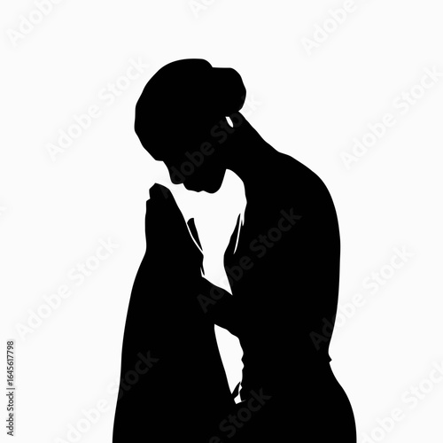 Silhouette of a woman praying, hands clasped in supplication.
