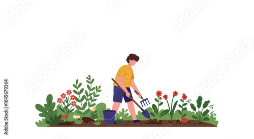 Man enjoying gardening hobby planting flowers and tending the soil with gardening tools outdoors in spring