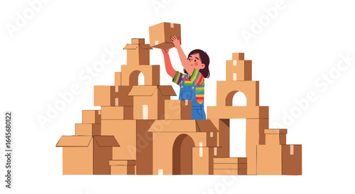 Creative Child Building a Cardboard Box Castle.