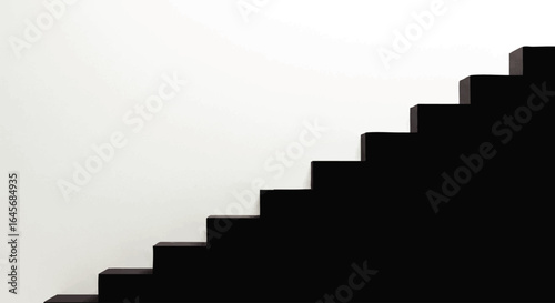 Stark black minimalist staircase ascending diagonally, a modern architectural silhouette.