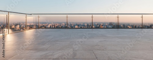 The Rooftop Terrace Overlooking a Distant City Skyline at Sunset