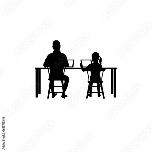 Father and daughter silhouette sitting at kitchen table using a tablet isolated on white background
