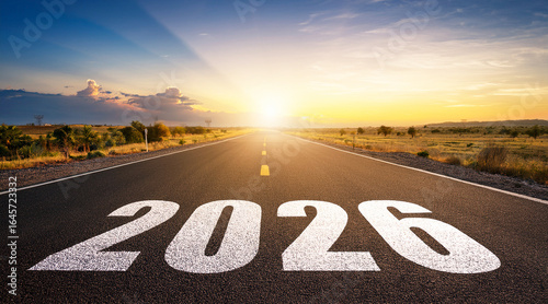 2026 New Year road trip travel and future vision concept . Nature landscape with highway road leading forward to happy new year celebration in the beginning of 2026 for elation and successful start .
