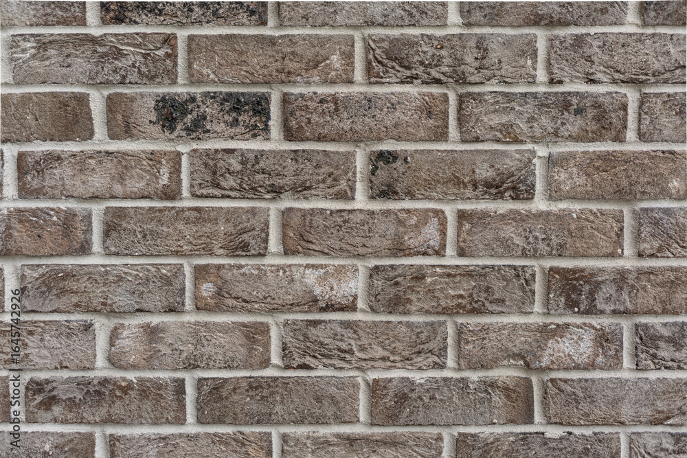 Obraz premium Gray brick wall, background for designer, copy space